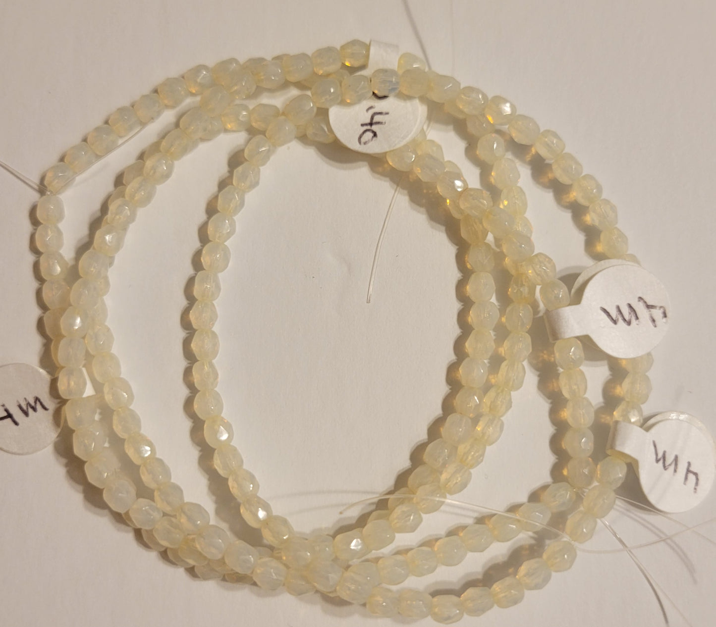 Creamy White Faceted Crystal Round - 4 mm