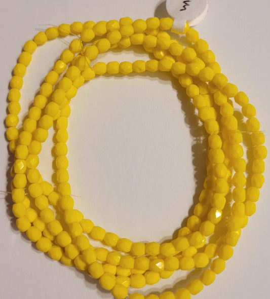 Opaque Yellow Faceted Crystal Round