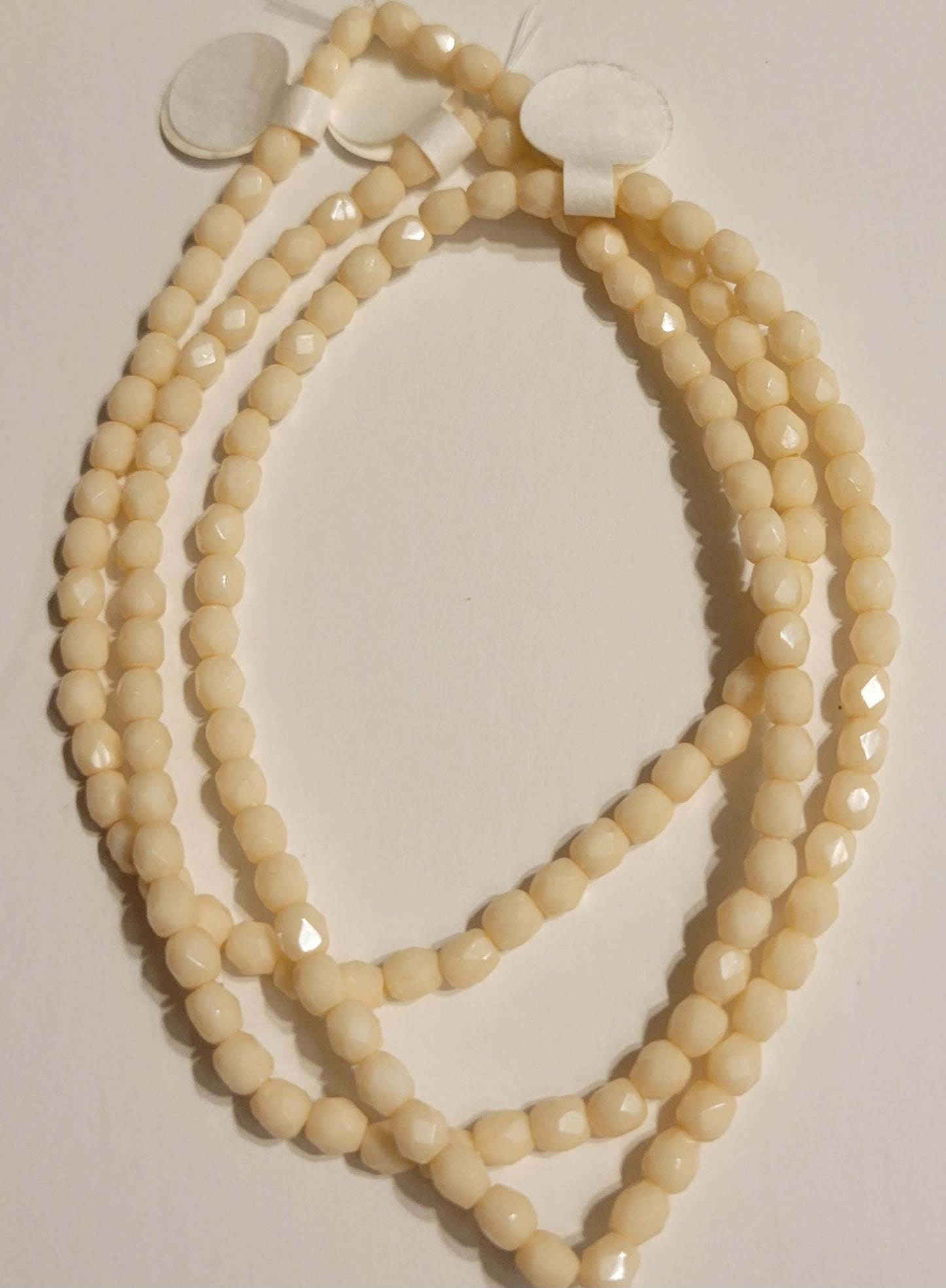 Opaque Cream Faceted Crystal Round - 4 mm