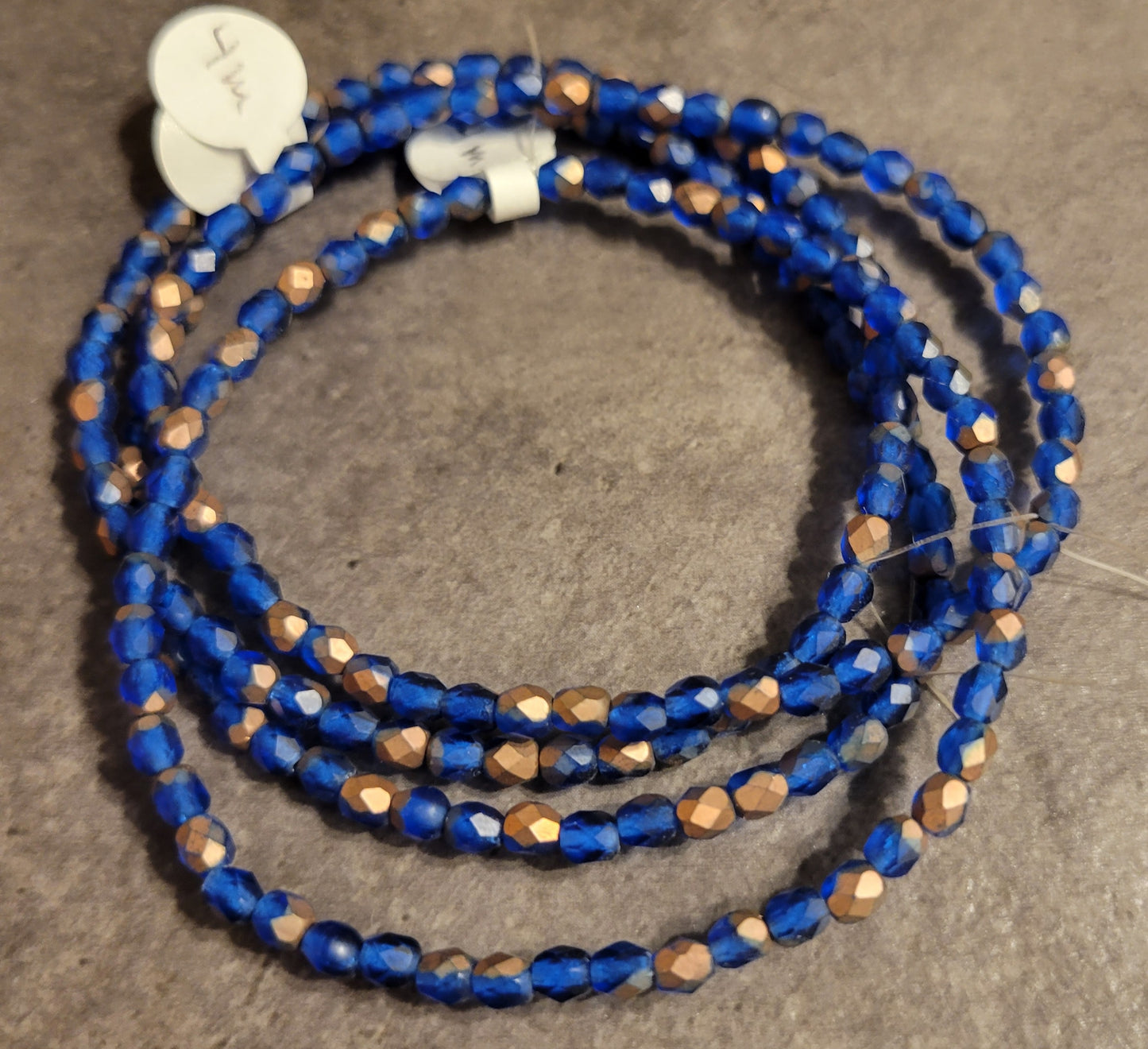 Blue/bronze Faceted Crystal - 4 mm