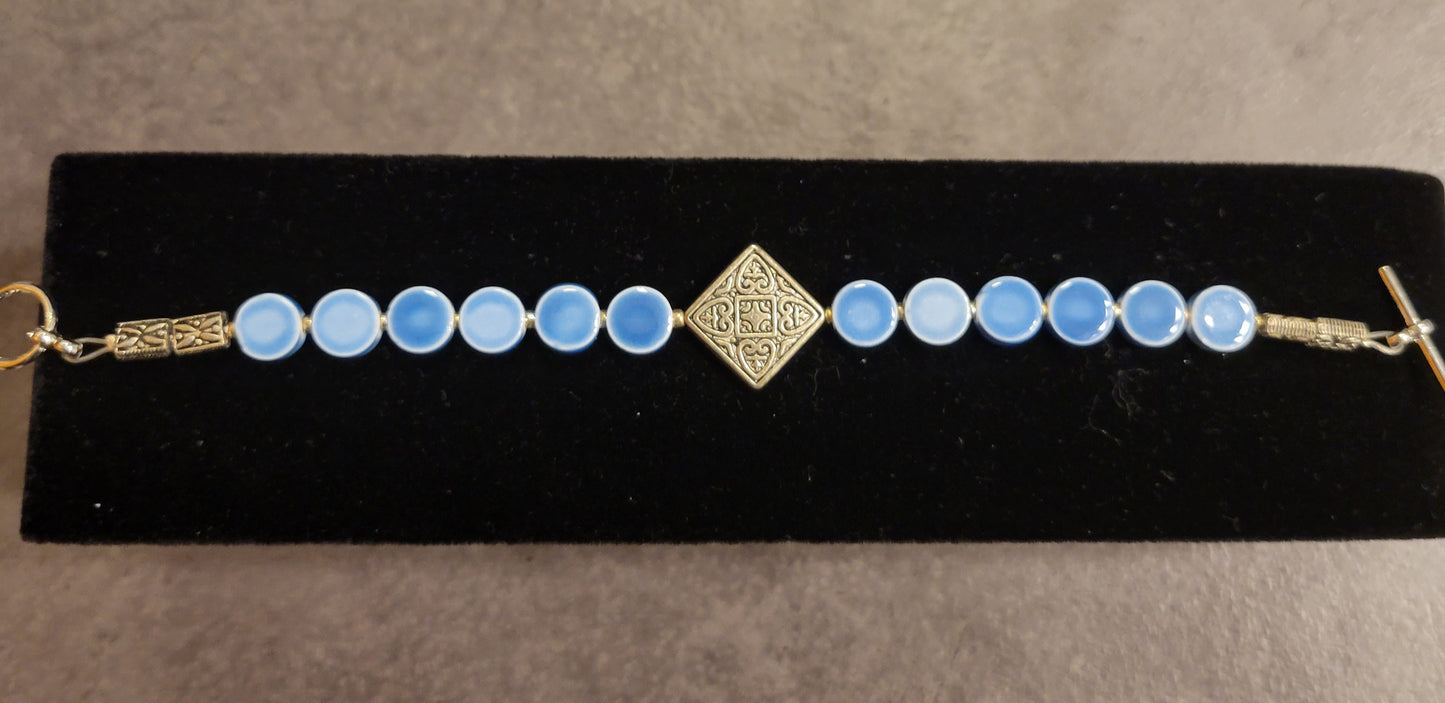 Bracelet - Blue Ceramic Beads w/Silver focal bead - Approx. 7 1/2"