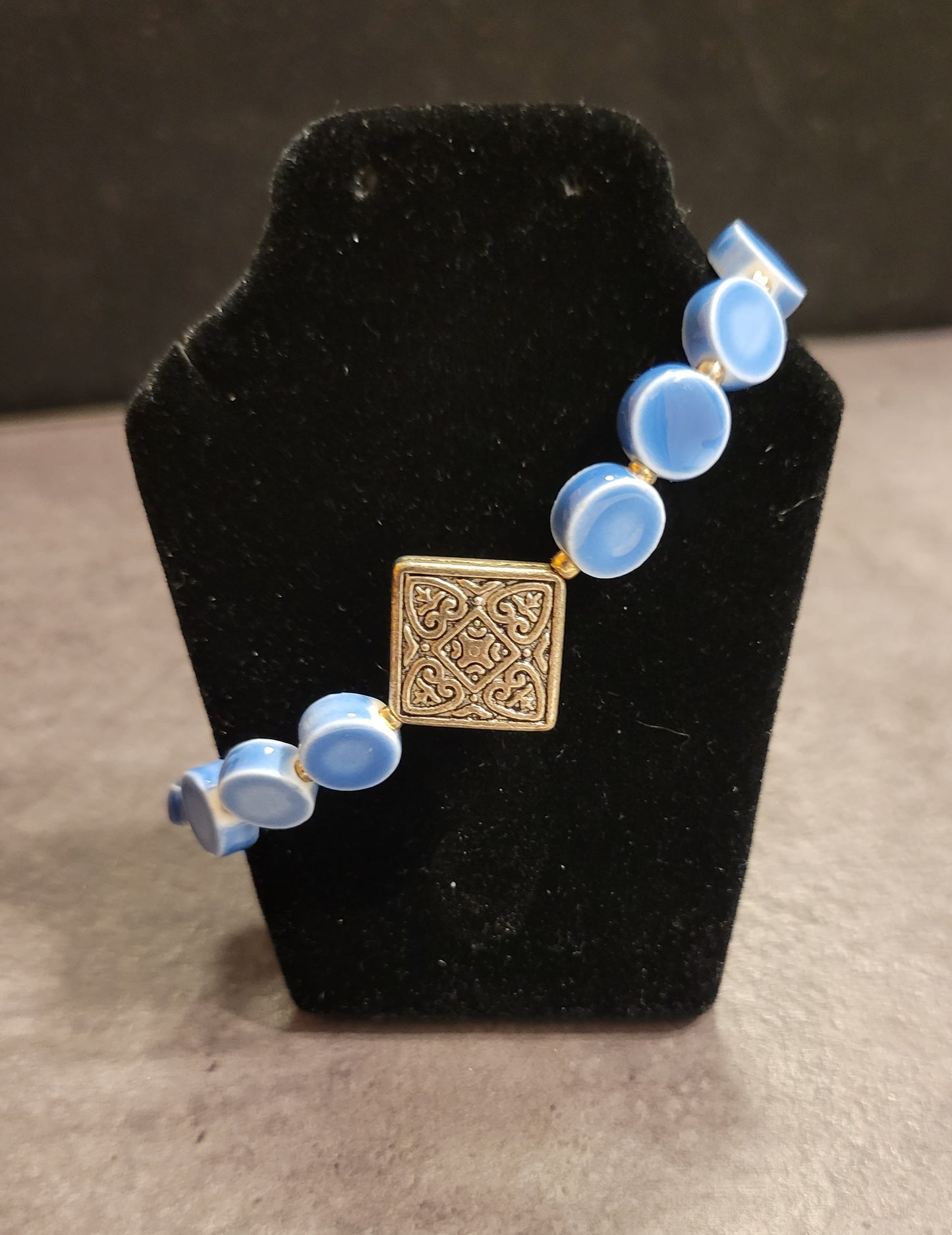 Bracelet - Blue Ceramic Beads w/Silver focal bead - Approx. 7 1/2"